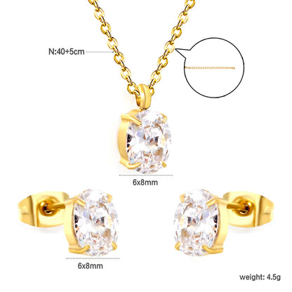 Oval white zirconium set Gold-colored earrings: 6*8mm Pendant: 6*8mm 0.3 cross chain *40+5cm+6mm round plate asonjewelry