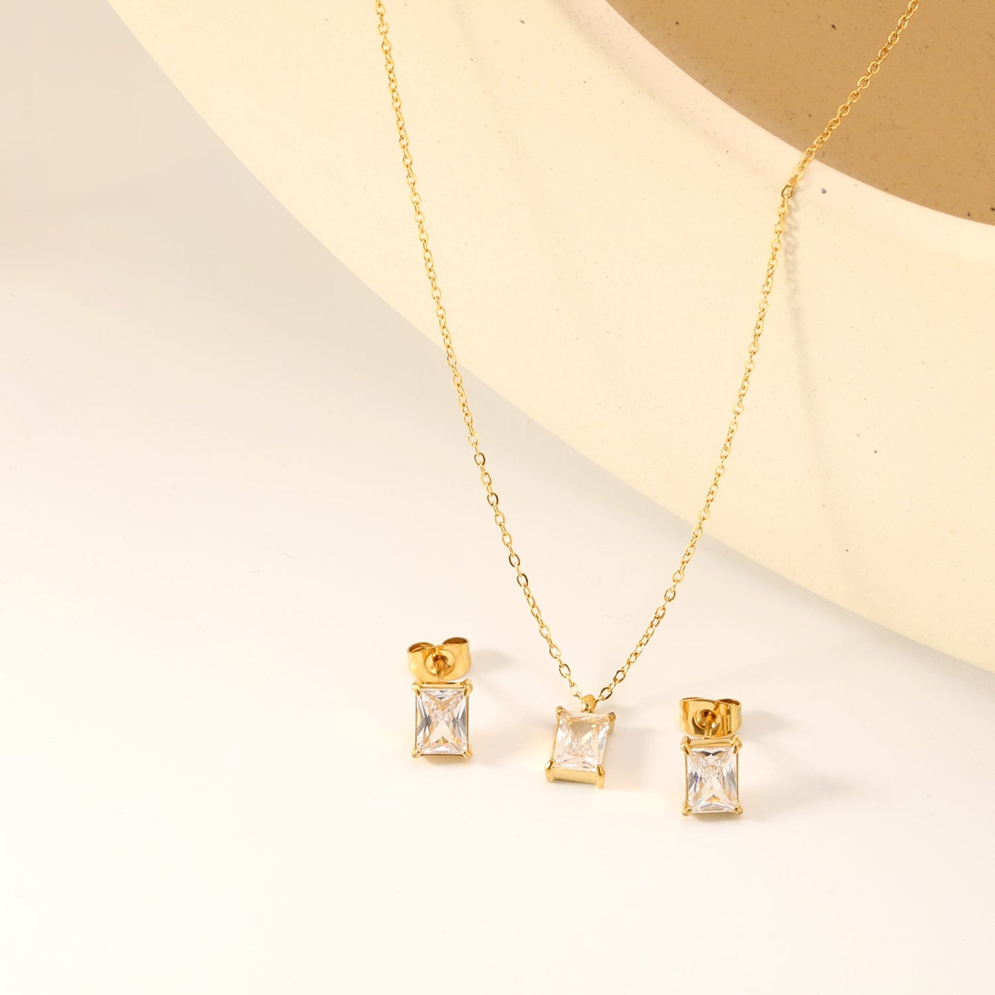 Rectangular white zirconium set Gold-colored earrings:5*7mm Pendant:5*7mm 0.3 cross chain*40+5cm+6mm round plate asonjewelry