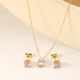 Round Zirconia Set Gold/Steel Earrings: 7mm Pendant: 7mm 0.3mm Cross Chain 40+5cm + 6mm Round Tag