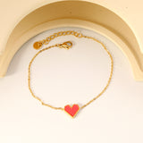 11.2*10.3mm heart shape with white shell/black acrylic/red acrylic fittings 0.35 cross chain*18+3cm+6mm round plaque Bracelet gold color