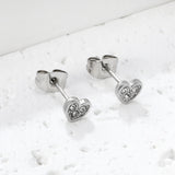 5.8 x 5.3 mm heart-shaped stud earrings with white rhinestones, steel/gold color