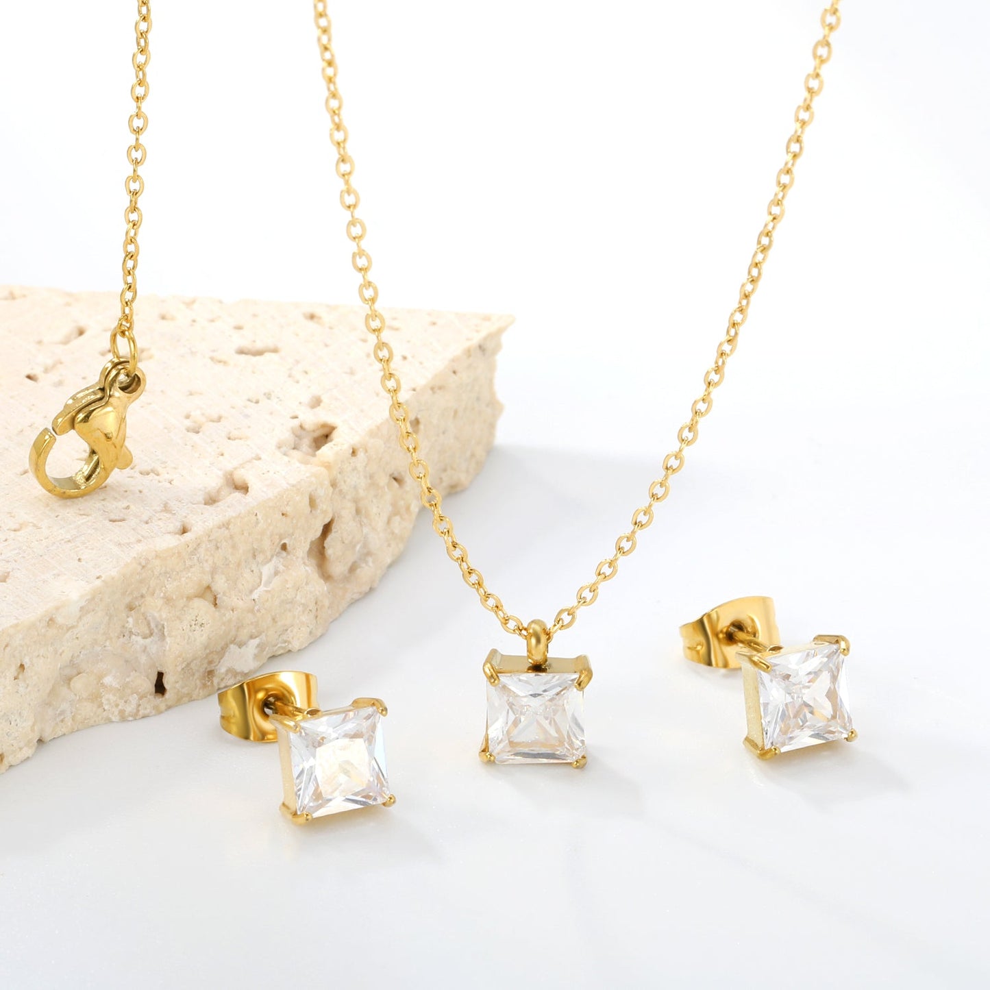 Square Zirconia Set Gold/Steel Tone Studs: 7mm Pendant: 7mm 0.3ct Cross Chain 40+5cm + 6mm Round Tag asonjewelry