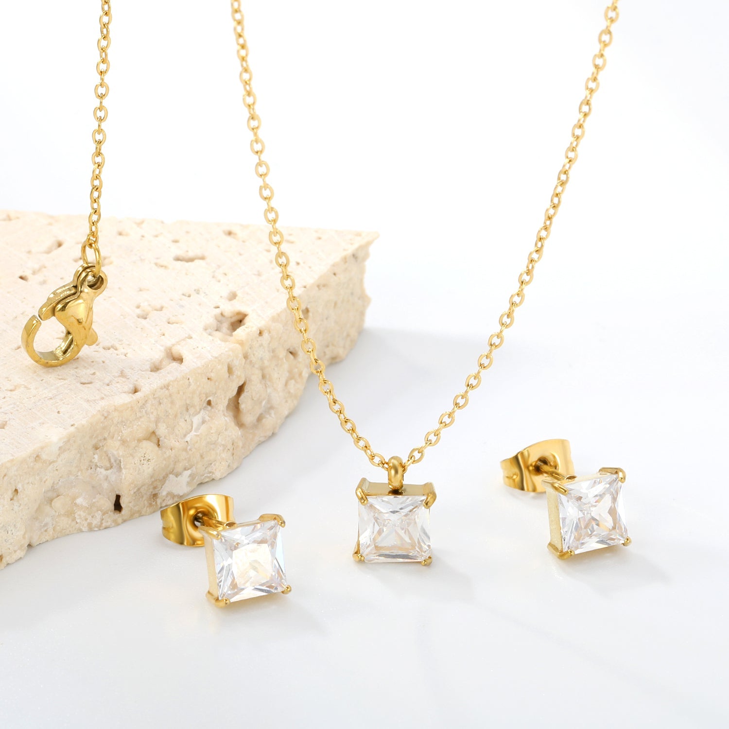 Square Zirconia Set Gold/Steel Tone Studs: 7mm Pendant: 7mm 0.3ct Cross Chain 40+5cm + 6mm Round Tag asonjewelry