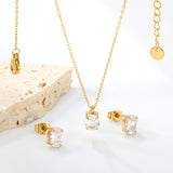 Oval Zirconia Set Gold/Steel Tone Studs: 6*8mm Pendant: 6*8mm 0.3ct Cross Chain 40+5cm + 6mm Round Tag