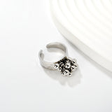 9.4mm high, color-matched French-style fringed round bead open ring, steel color, interwoven gold