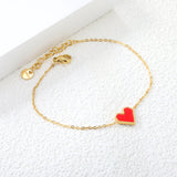 11.2*10.3mm heart shape with white shell/black acrylic/red acrylic fittings 0.35 cross chain*18+3cm+6mm round plaque Bracelet gold color