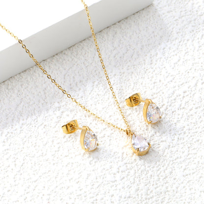 Teardrop White Zircon Set Gold/Steel-Tone Studs: 6.1*9.4mm Pendant: 6.1*9.4mm 0.3ct Cross Chain 40+5cm + 6mm Round Tag asonjewelry