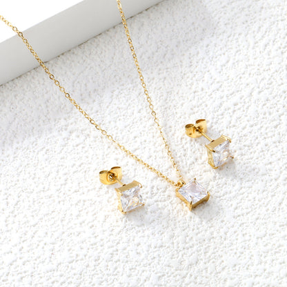 Square Zirconia Set Gold/Steel Tone Studs: 7mm Pendant: 7mm 0.3ct Cross Chain 40+5cm + 6mm Round Tag asonjewelry