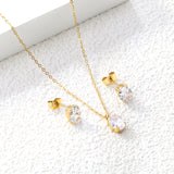 Oval white zirconium set Gold-colored earrings: 6*8mm Pendant: 6*8mm 0.3 cross chain *40+5cm+6mm round plate