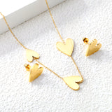 Peach heart set Gold-colored earrings:1.2*12*15mm Pendant:10*12+12*15+13*17mm 0.3 Cross chain*40+5cm+6mm round plaque