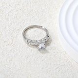 Stainless Steel Ring with Round Diamond & Teardrop Side Stones