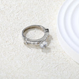 Stainless Steel Ring with Round Center Diamond & Rectangular Side Diamonds