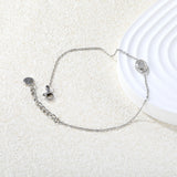 8.6 x 6.8mm raised edge oval 0.3 cross chain bracelet 18+3cm+6mm round pendant Steel color/gold color