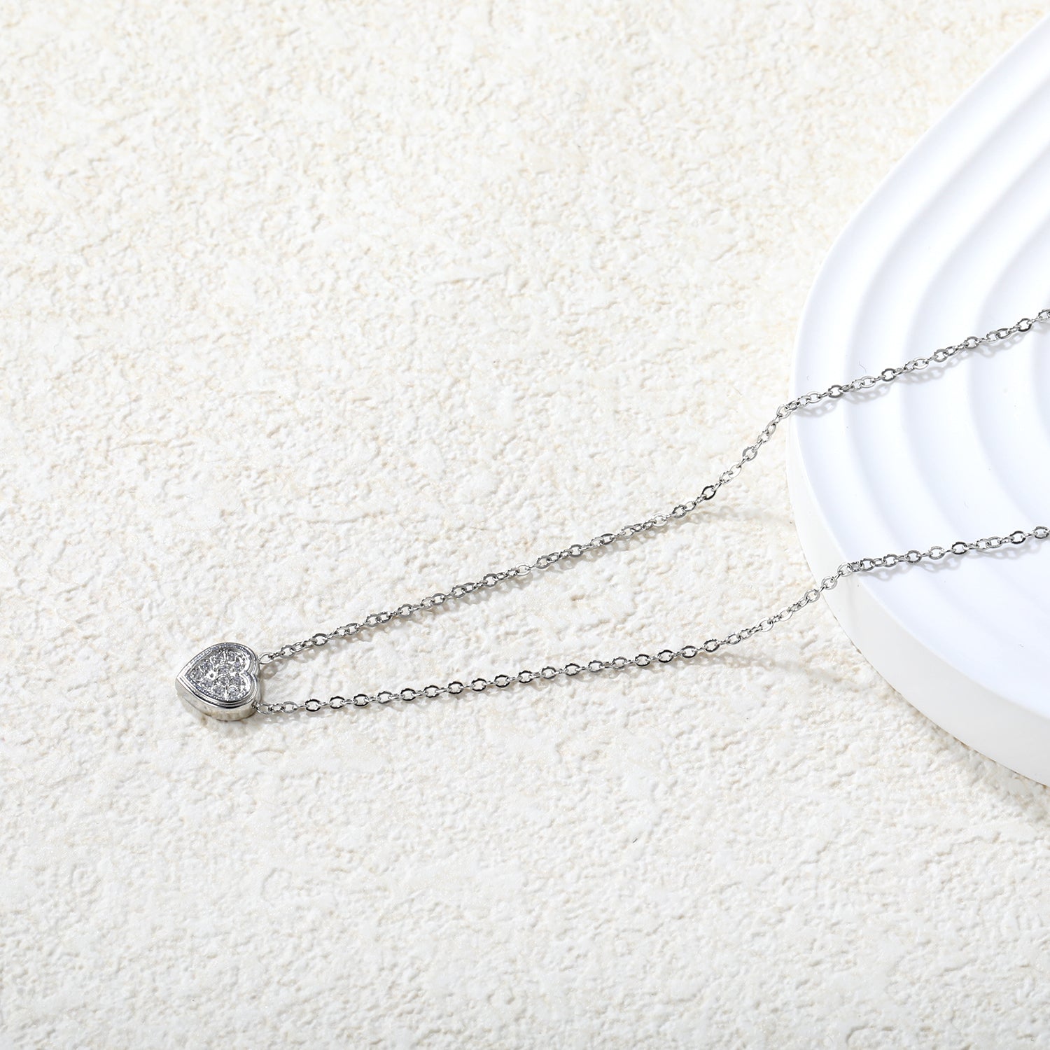 7.7 x 8mm beveled heart-shaped CNC white zirconia pendant with 0.3mm cross chain (40+5cm) and 6mm round tag necklace in steel gray/gold asonjewelry