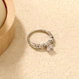 Stainless Steel Ring with Round Diamond & Teardrop Side Stones