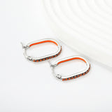 2.26 * 22mm oval-shaped geometric band with white/purple/blue/pink/orange diamonds, ear hooks, steel color