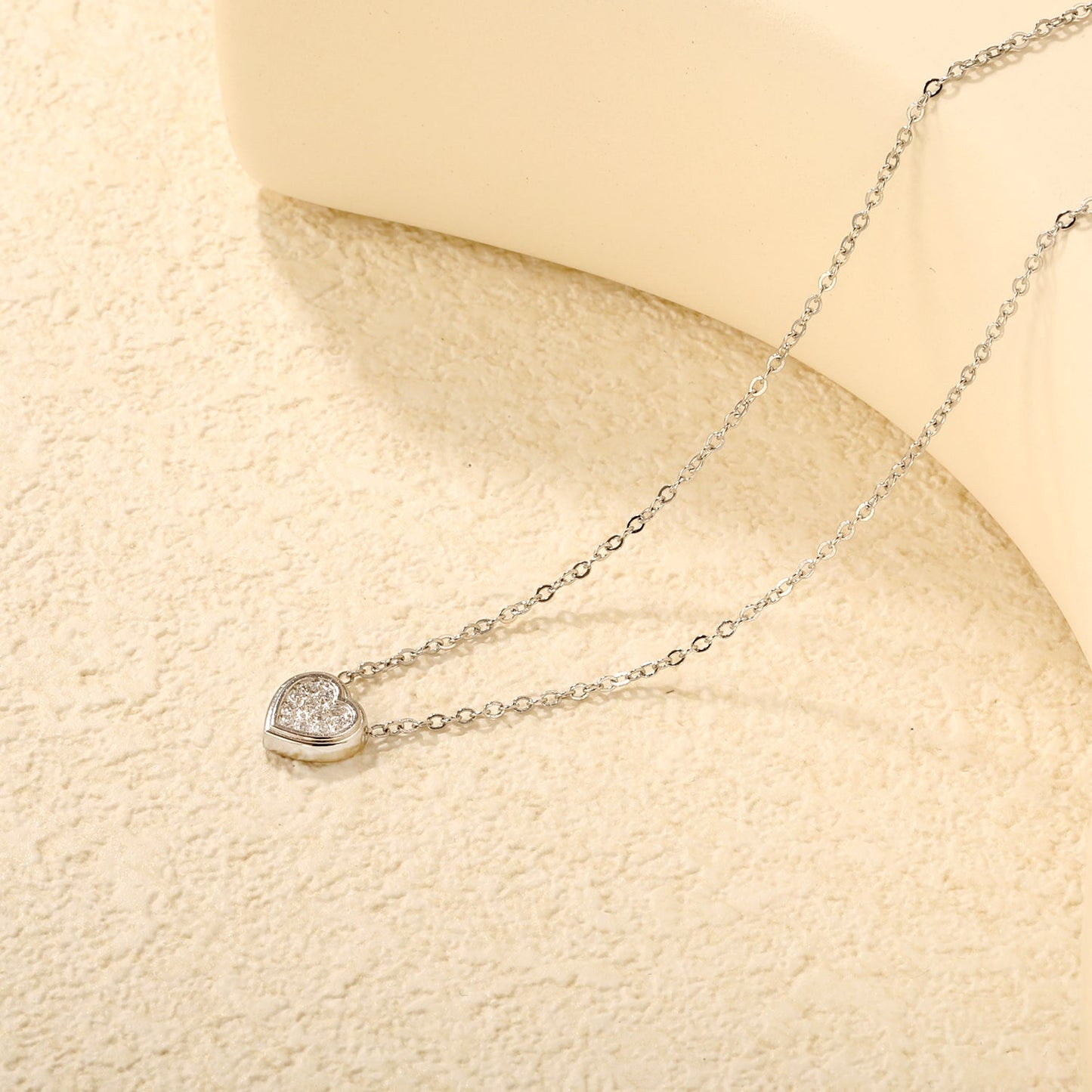 7.7 x 8mm beveled heart-shaped CNC white zirconia pendant with 0.3mm cross chain (40+5cm) and 6mm round tag necklace in steel gray/gold asonjewelry