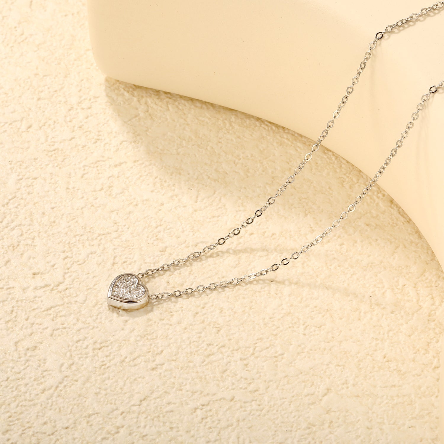 7.7 x 8mm beveled heart-shaped CNC white zirconia pendant with 0.3mm cross chain (40+5cm) and 6mm round tag necklace in steel gray/gold asonjewelry