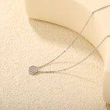 7.8 x 8.6mm raised-edge hexagonal CNC white zirconia pendant 0.3mm cross chain 40+5cm + 6mm round pendant necklace Steel/Gold