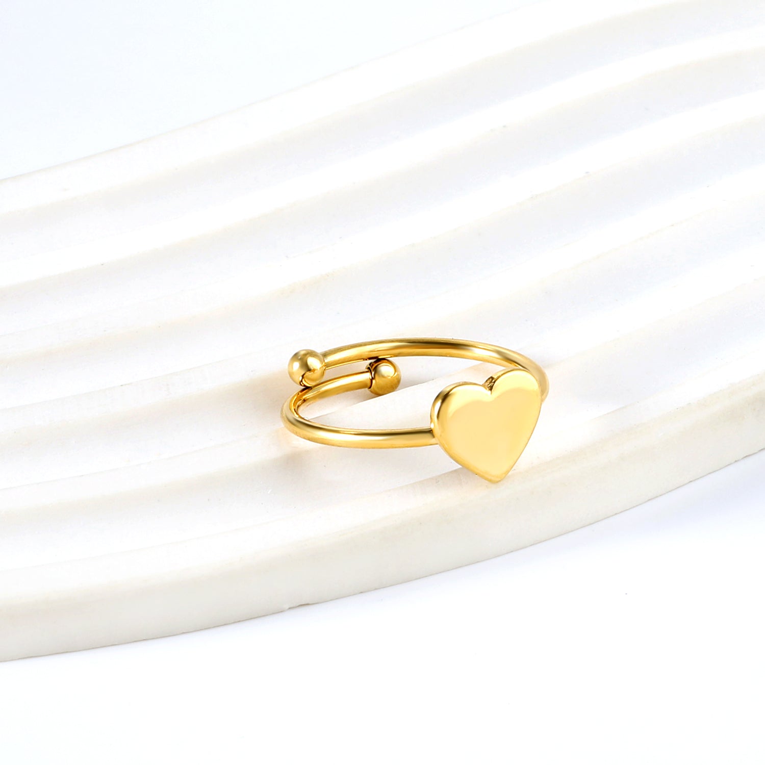 Heart shaped ring with an open cylindrical end asonjewelry