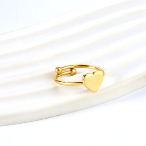 Heart shaped ring with an open cylindrical end
