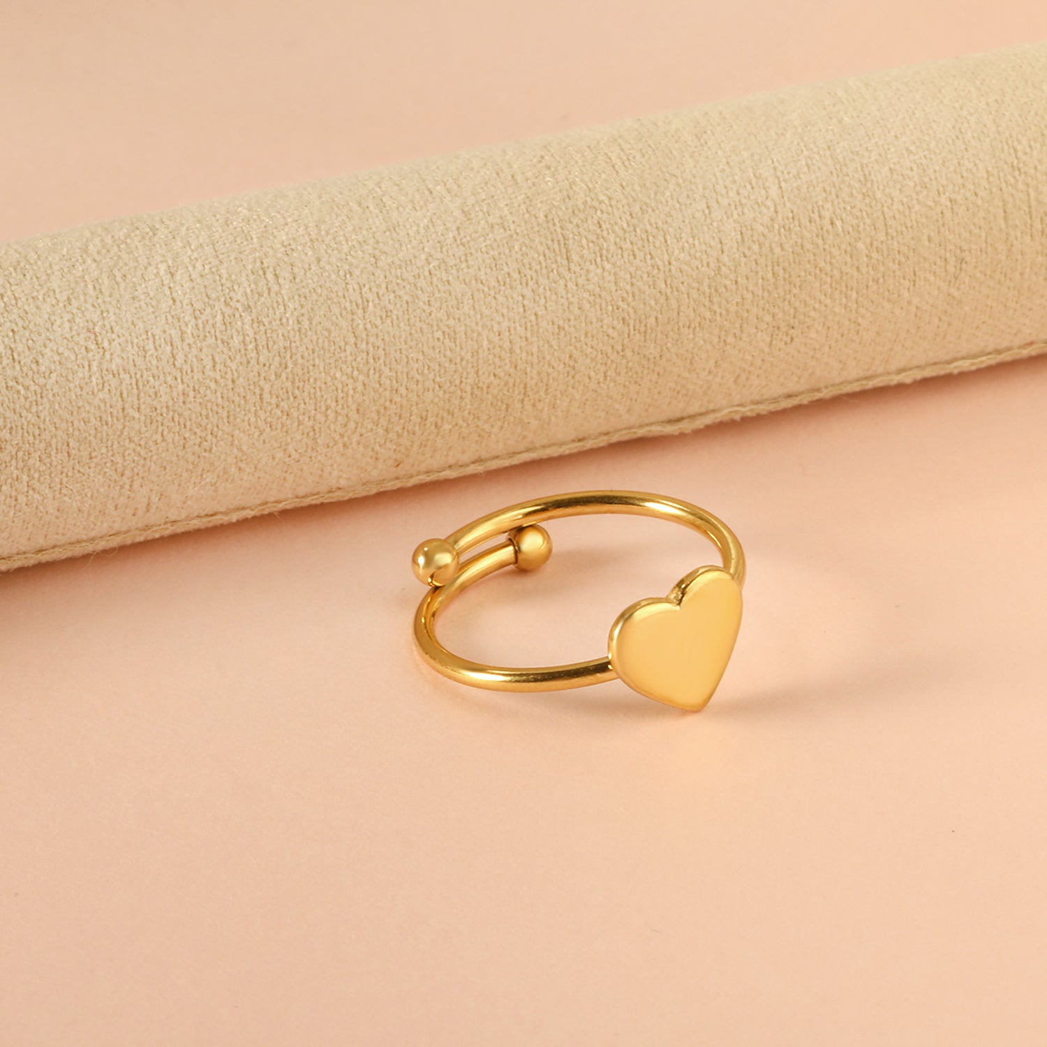 Heart shaped ring with an open cylindrical end asonjewelry