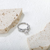 Stainless Steel Ring with Round Diamond & Emerald - Cut Side Accents
