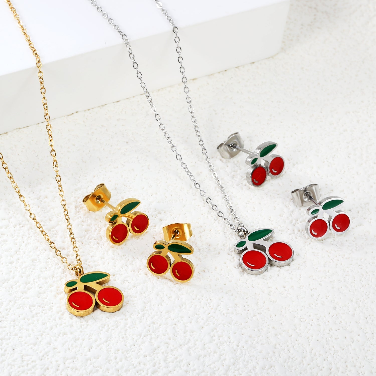 Cherry with red oil drops set Steel color/golden 0.3 cross 40+5cm+6mm round plaque earrings: 10.3*9mm pendant: 12.2*11mm asonjewelry