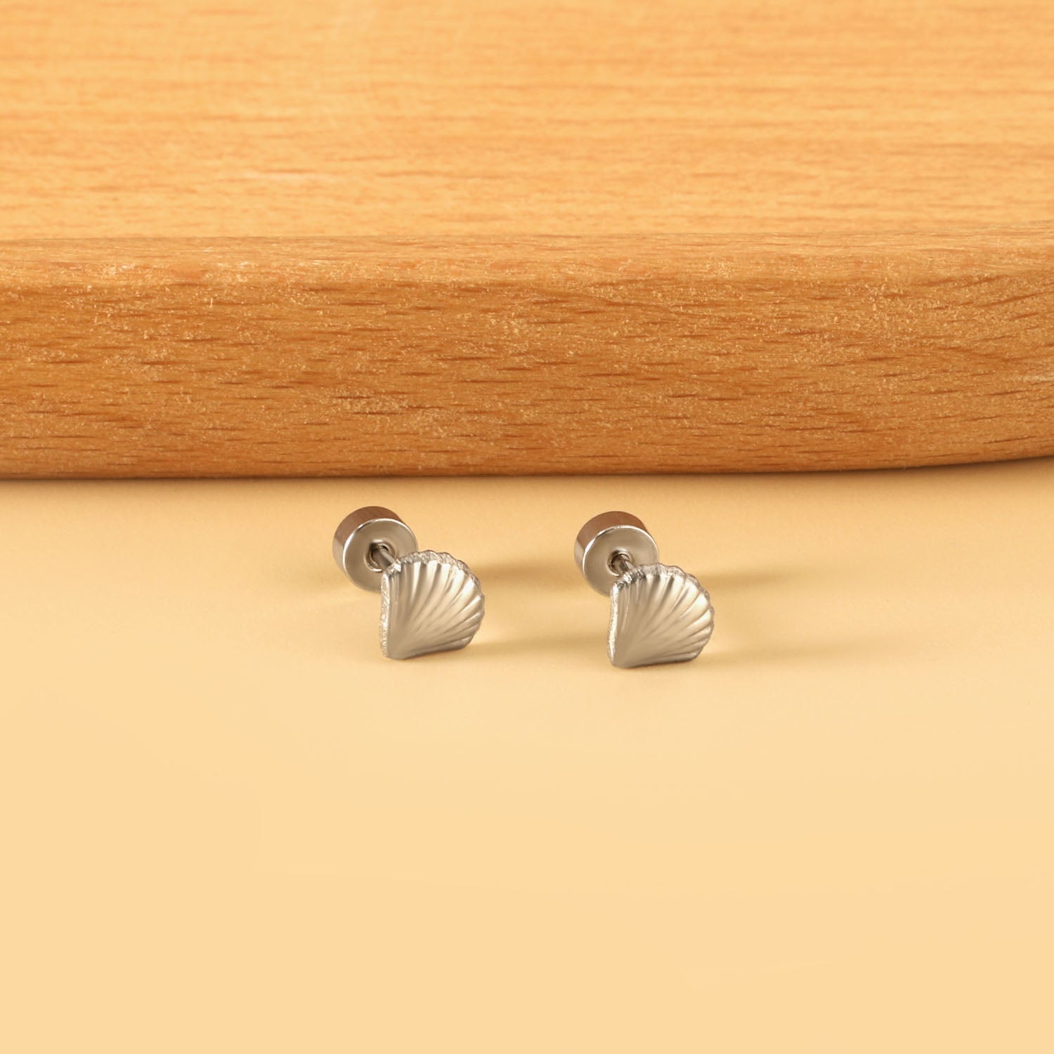 12 pairs shell shape screw-in earrings steel color asonjewelry