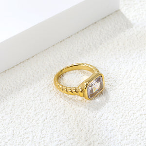 Oversized white diamonds on a threaded band ring.