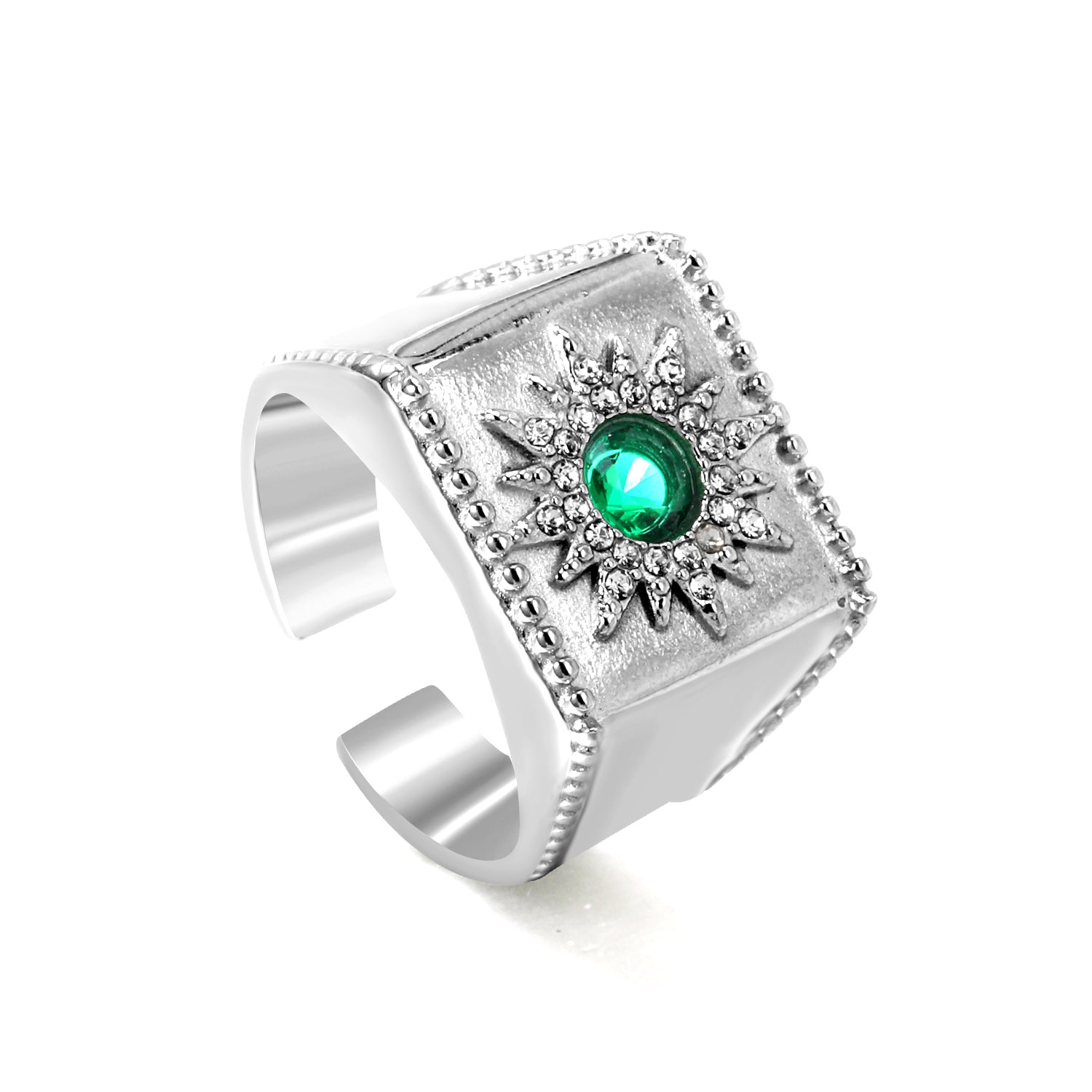 Exaggerated ring with green diamonds and engraved stamens. asonjewelry