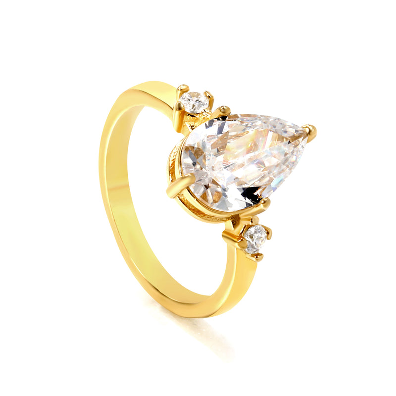 Set with a large teardrop diamond and two small diamond rings