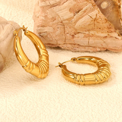 Hollow fat oval three-section striped gold-colored ear clips 30.4mm asonjewelry