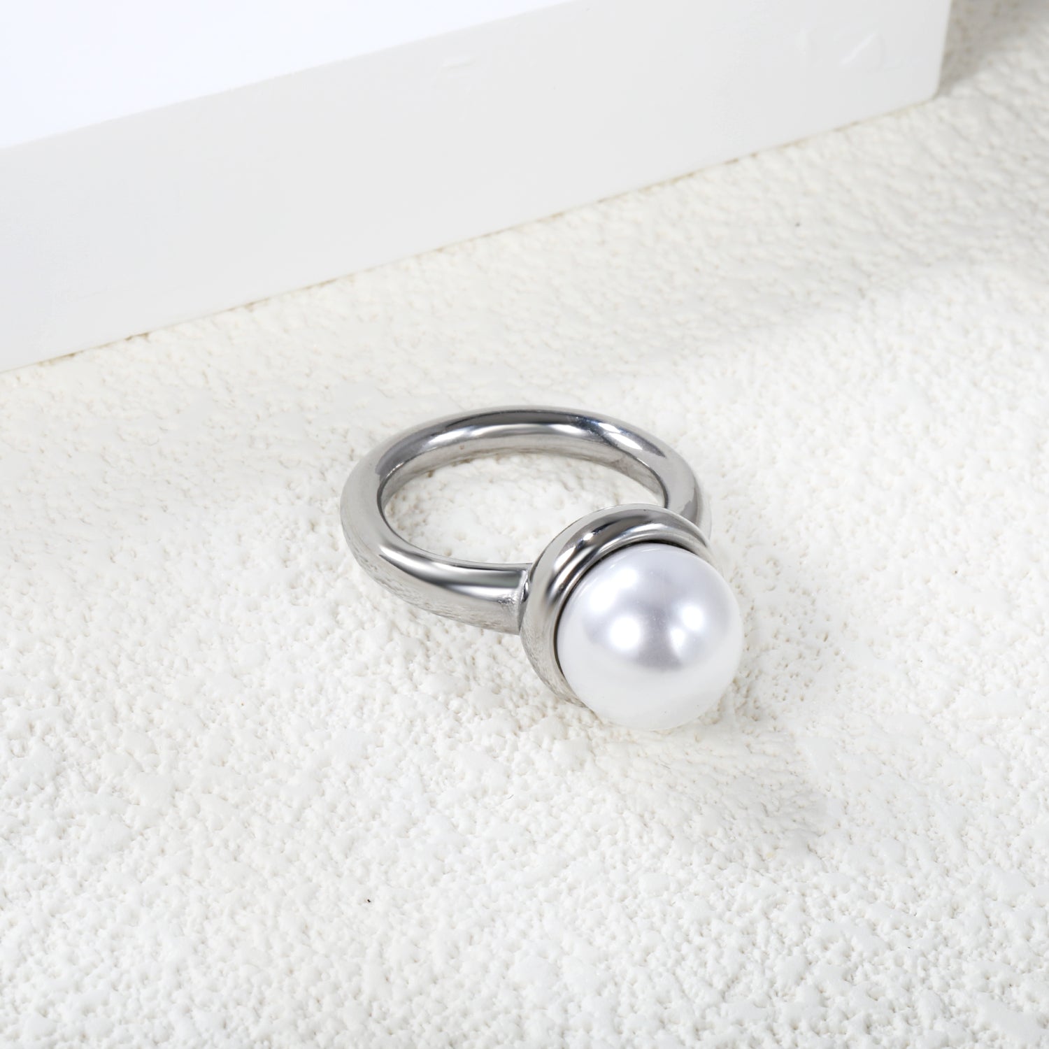 Minimalist band ring with oversized white round pearls. asonjewelry