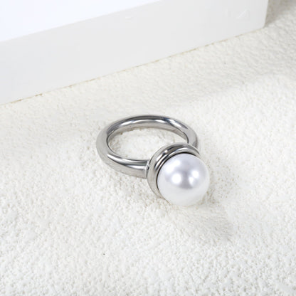 Minimalist band ring with oversized white round pearls. asonjewelry