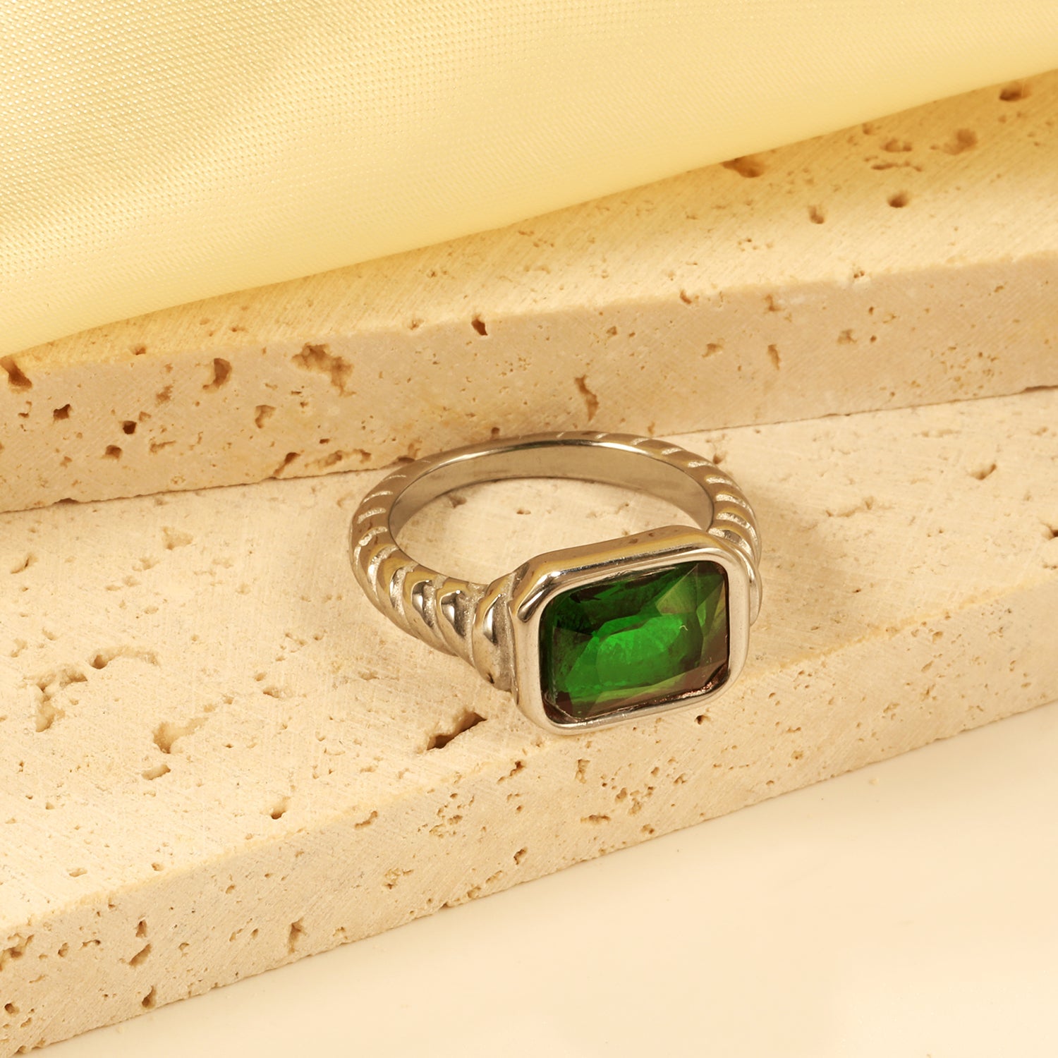 Oversized green diamonds on a threaded band ring. asonjewelry