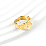 Exaggerated ring with cratered surface