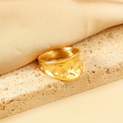 Exaggerated ring with cratered surface asonjewelry