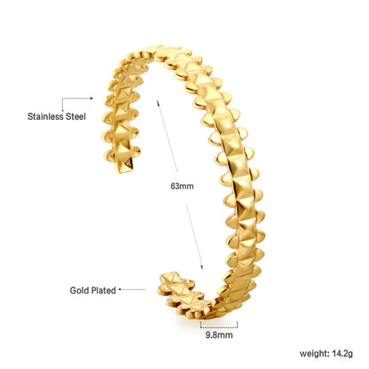 Bracelet with uneven surface in the shape of an open spine asonjewelry