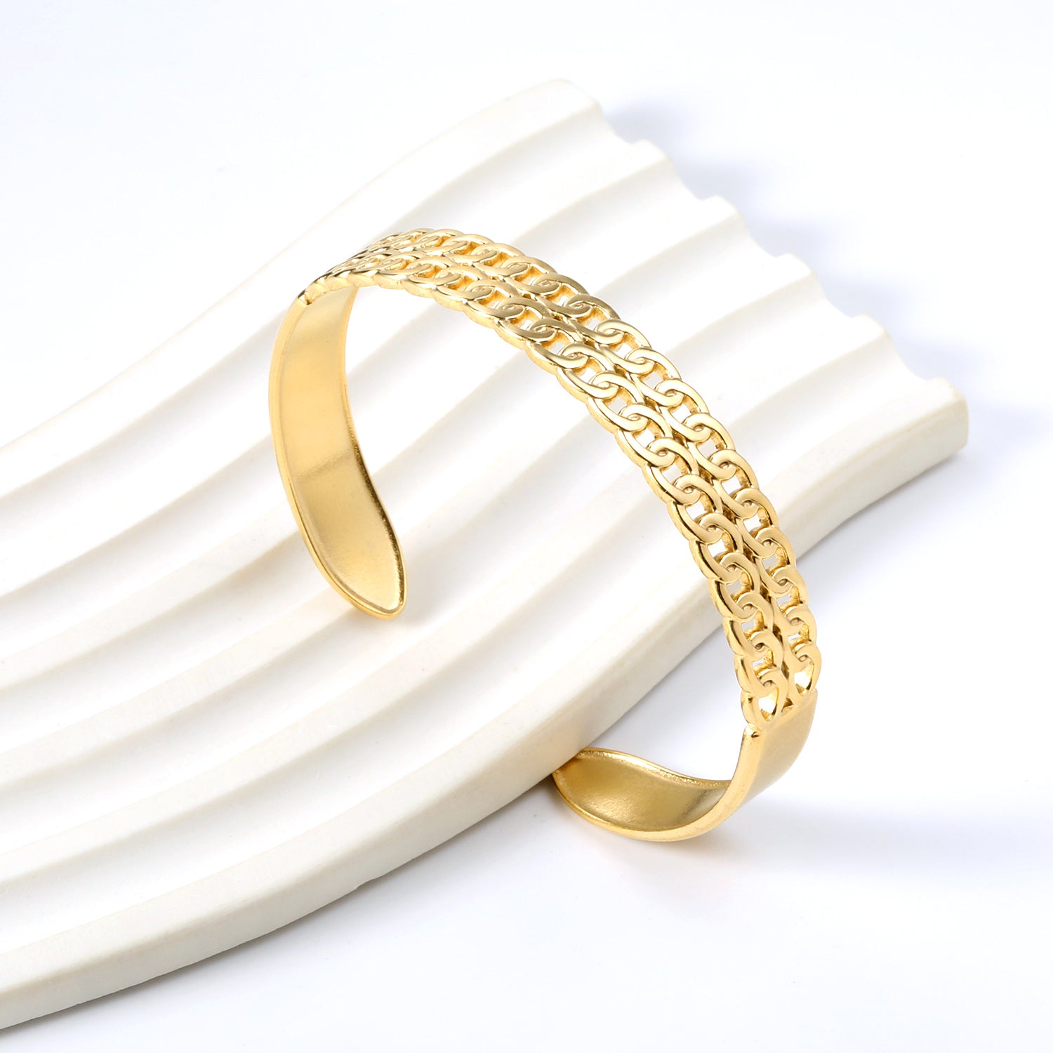 Oval openworked bracelet with double opening and several interconnected same-size pieces asonjewelry