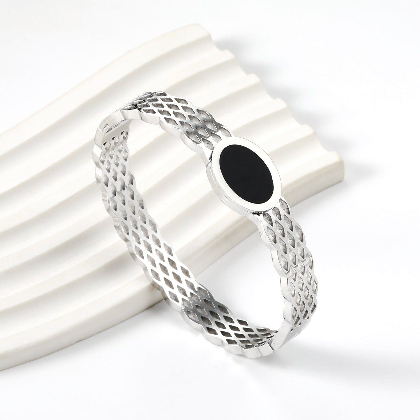 Woven mesh bracelet with black round oil drops. asonjewelry