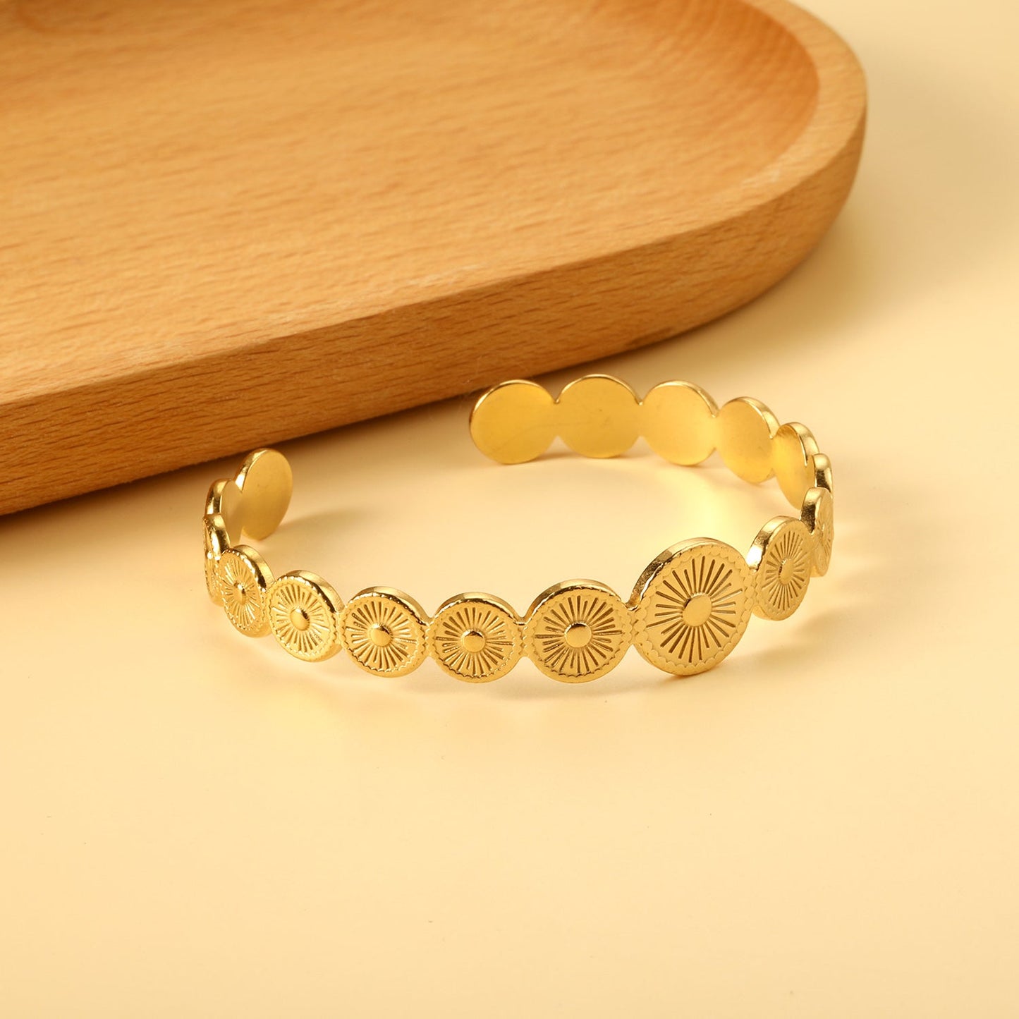 Bracelet with multiple open discs forming an irregularly striped surface asonjewelry