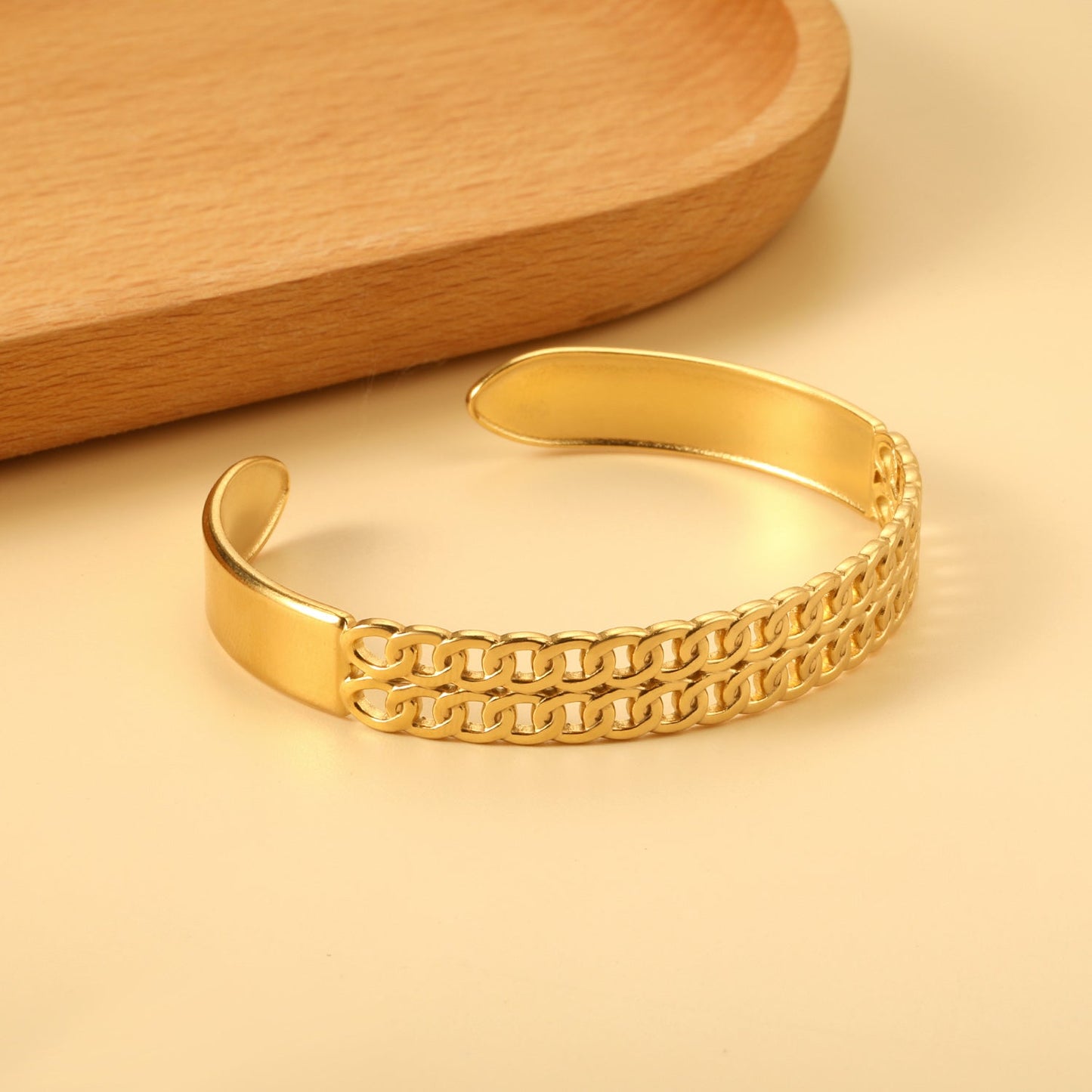 Oval openworked bracelet with double opening and several interconnected same-size pieces asonjewelry