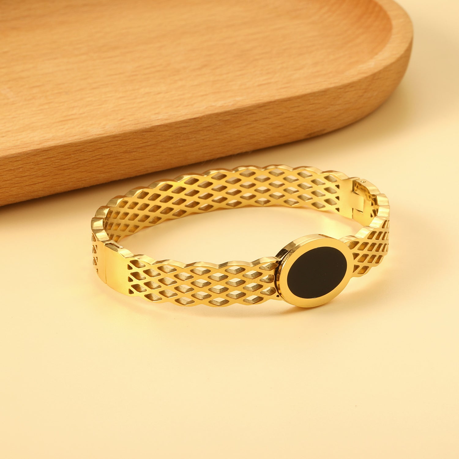Woven mesh bracelet with black round oil drops. asonjewelry