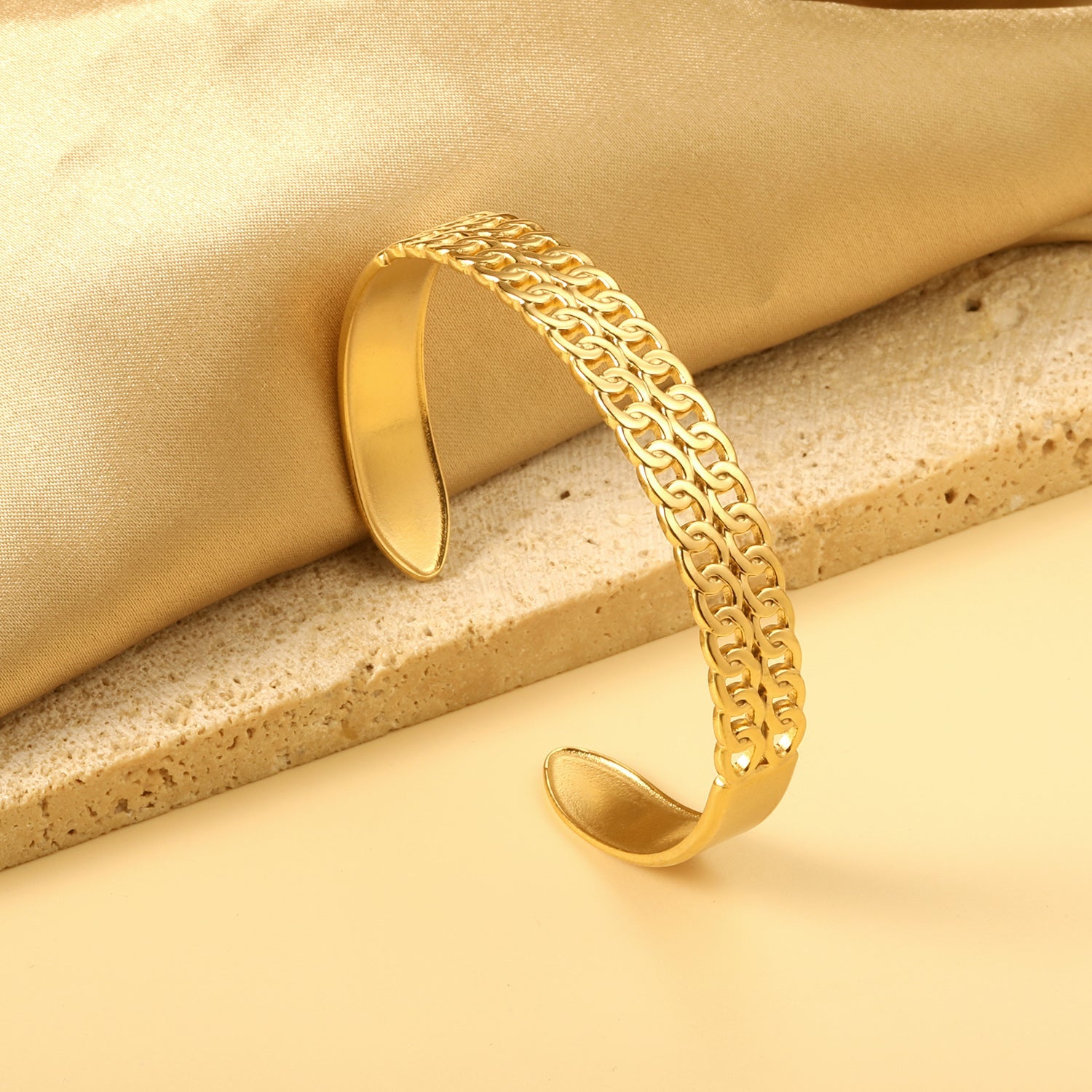 Oval openworked bracelet with double opening and several interconnected same-size pieces asonjewelry