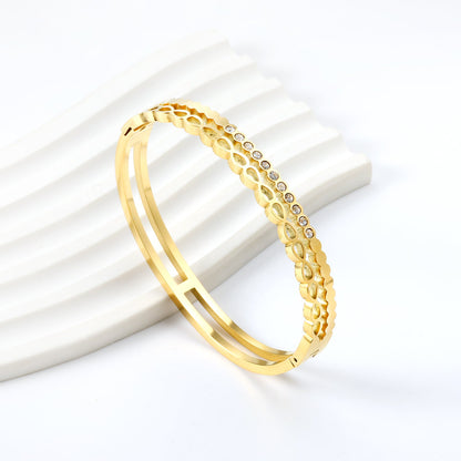 Gold-colored double stranded bracelet with diamonds asonjewelry