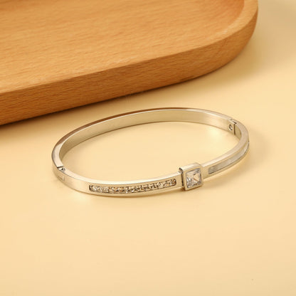 Bracelet combining two rectangular shells & diamond-set surfaces asonjewelry