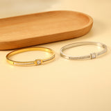 Bracelet combining two rectangular shells & diamond-set surfaces