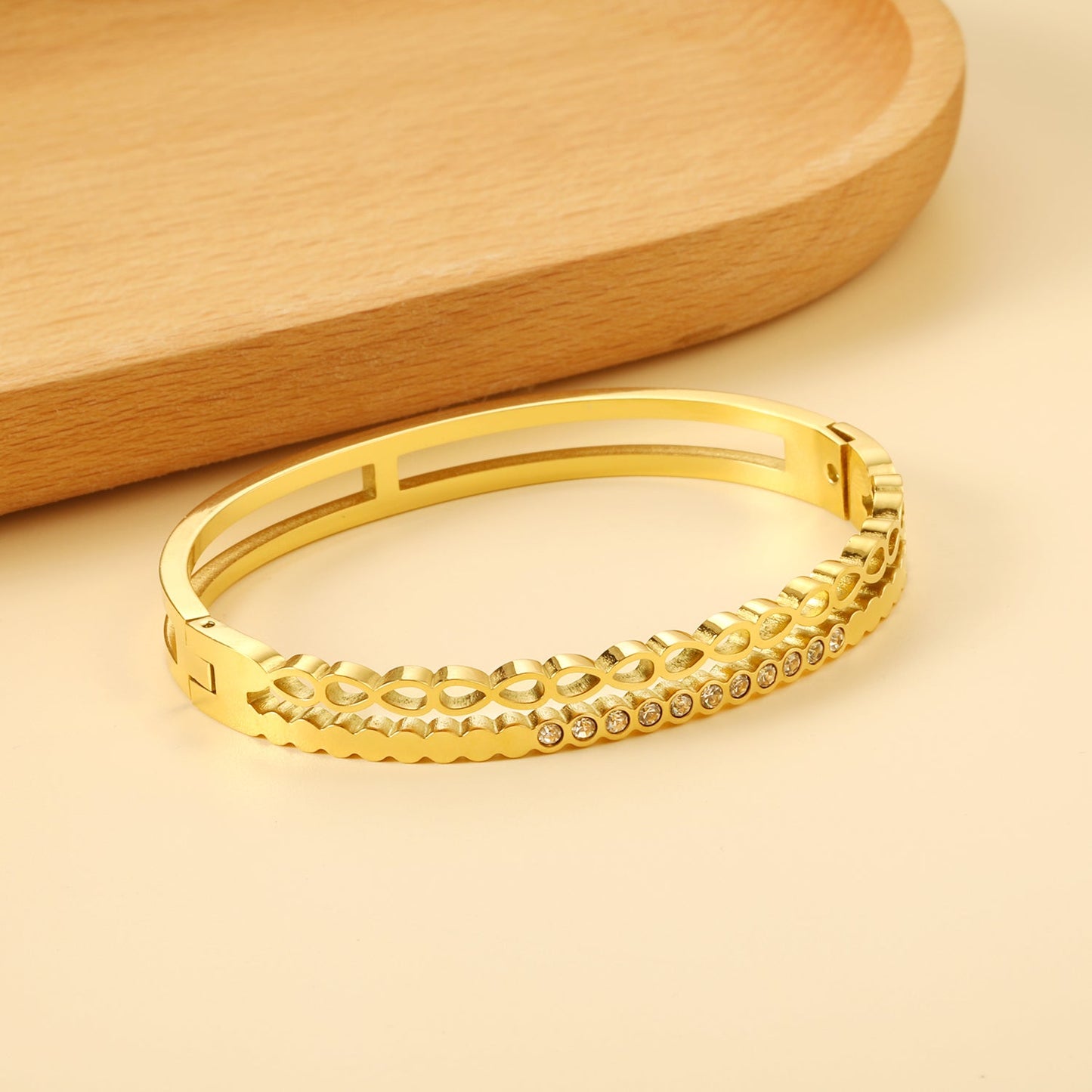 Gold-colored double stranded bracelet with diamonds asonjewelry
