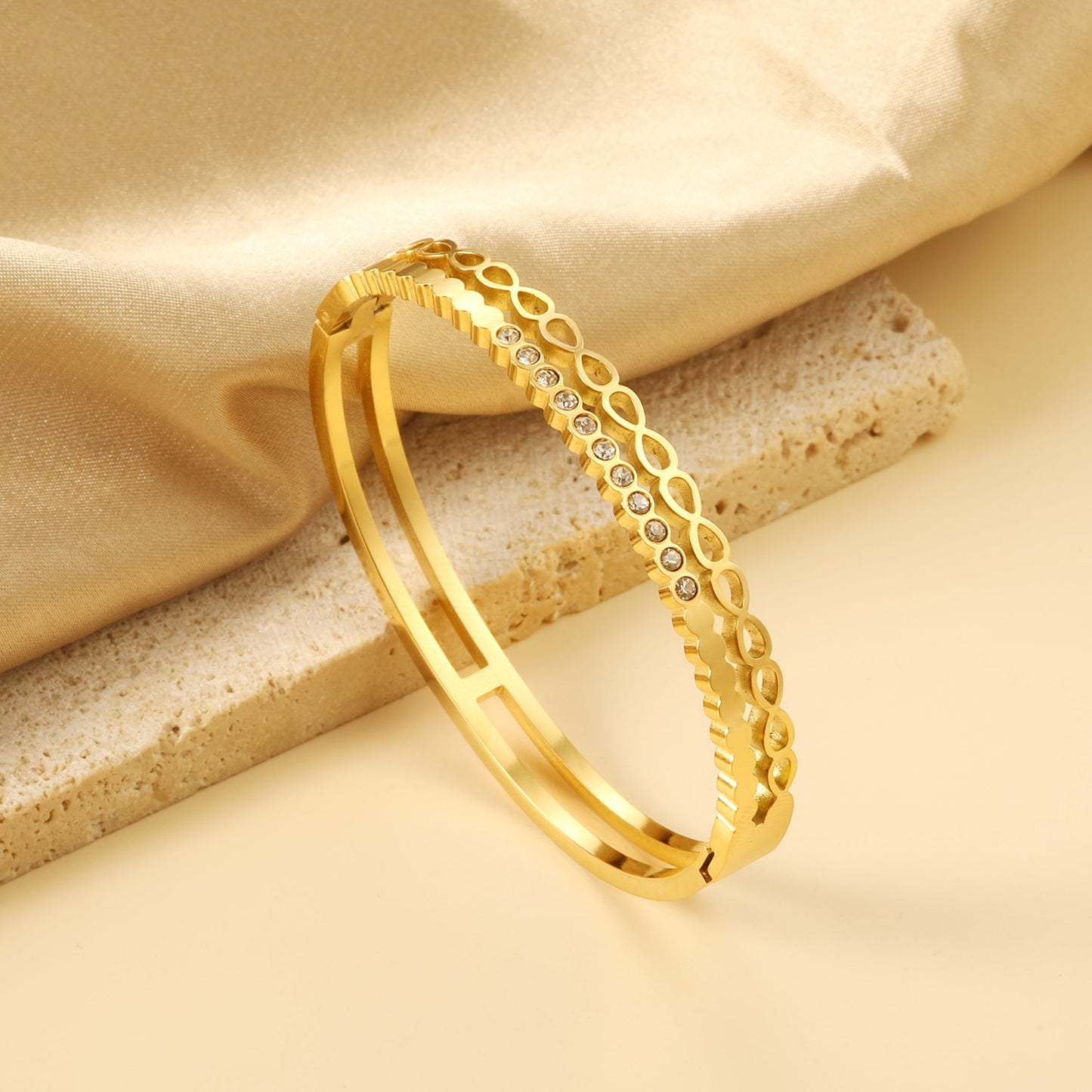 Gold-colored double stranded bracelet with diamonds asonjewelry